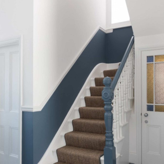 modern hallways, playing with bold colours like stoney blue below the dado rail