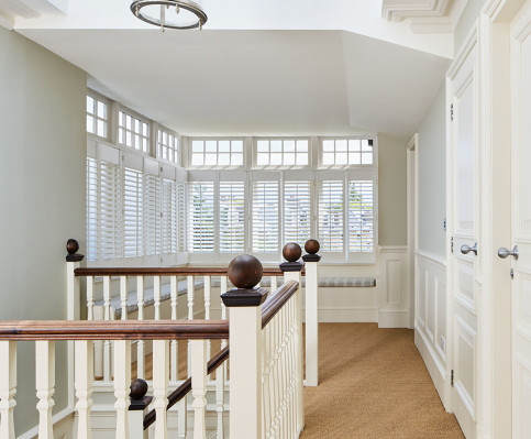 painted hallway with lots of light and skylight